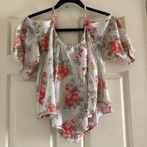 Rose patterned cold-shoulder blouse